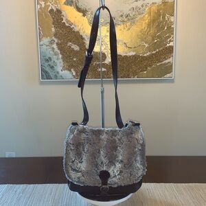 Patricia Nash faux fur and leather saddle bag EUC